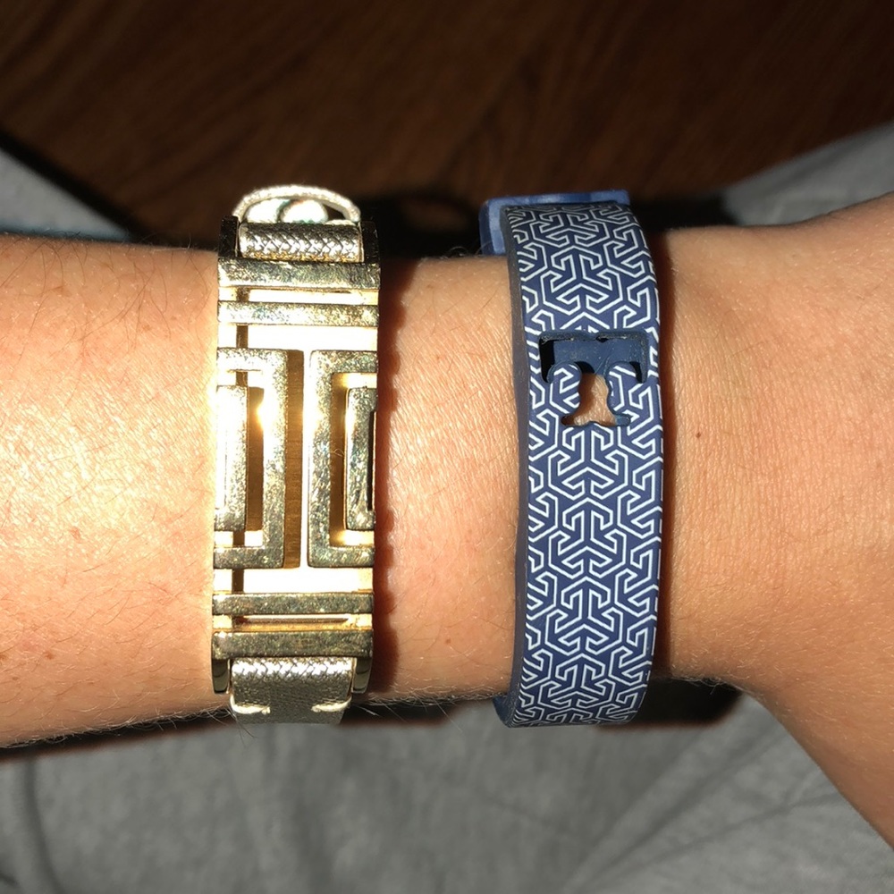 two Tory Burch Fitbit bracelet holders